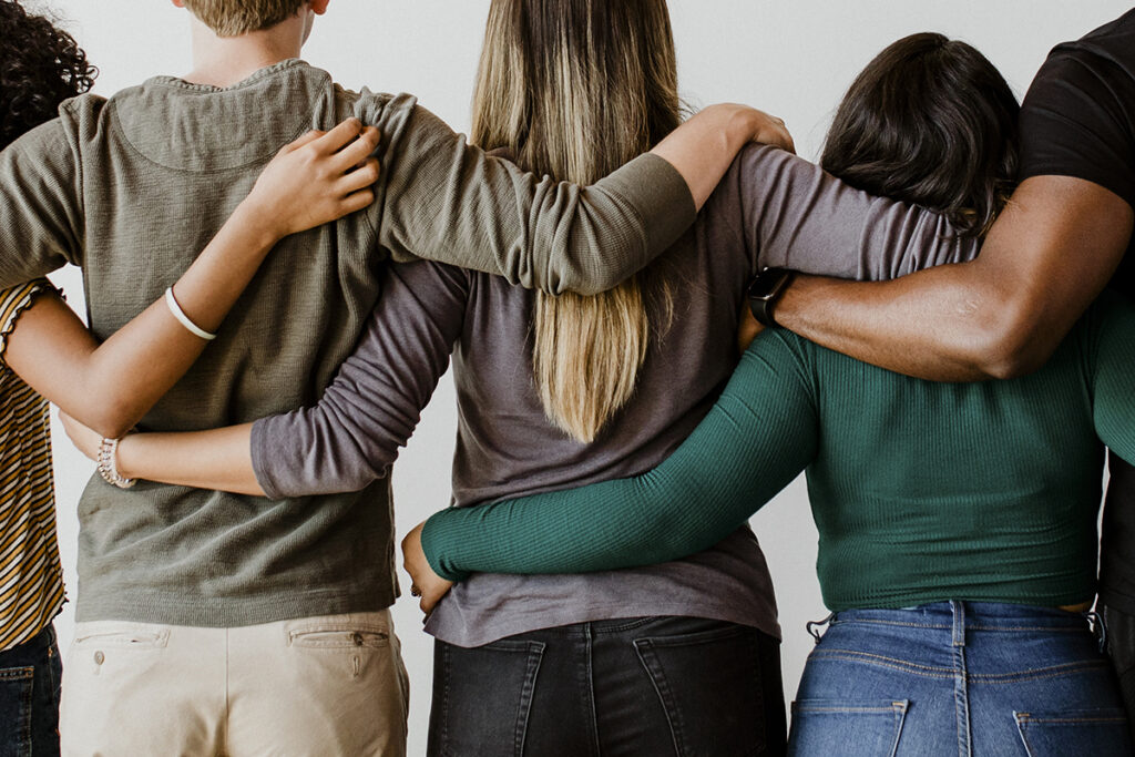 group of friends together celebrating National Recovery Month