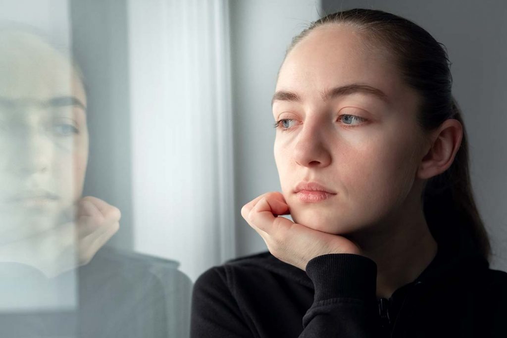 woman wonders how addiction impacts mental health