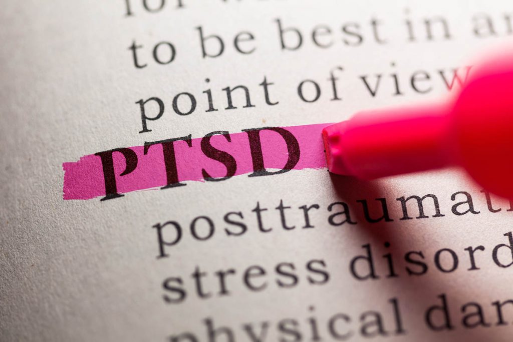 individual learning about PTSD during PTSD awareness month