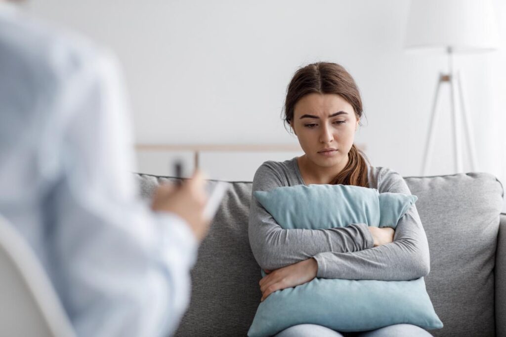 woman in therapy session for xanax addiction